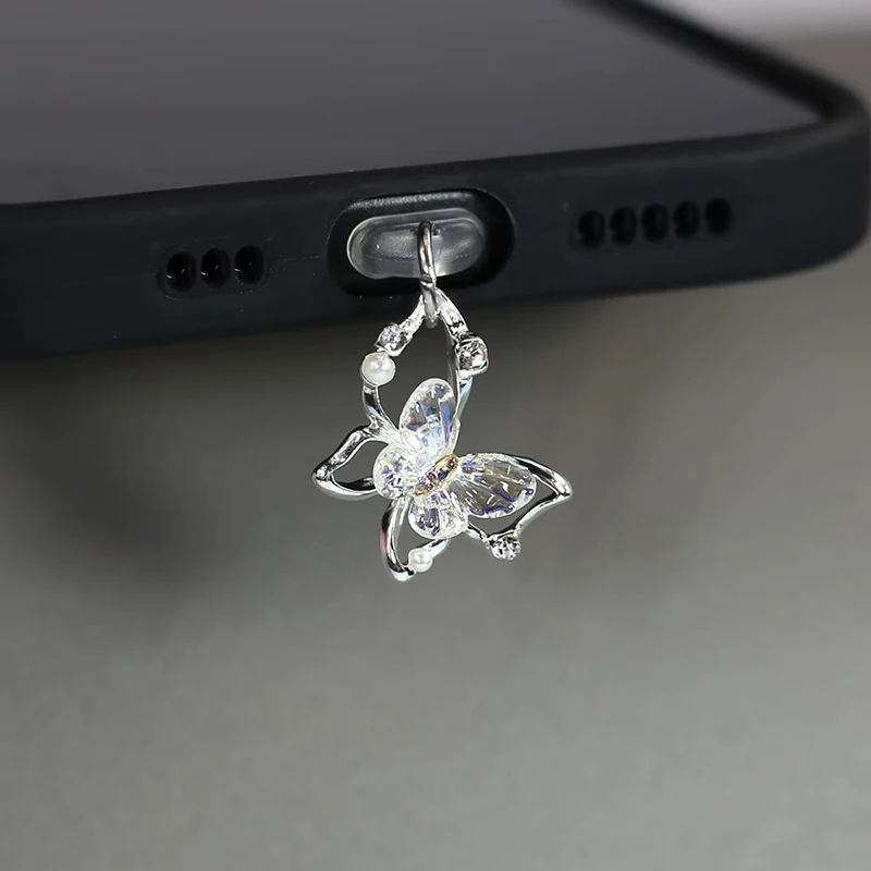 Bouchon anti-poussière papillo - Mobile Tech Accessories avis et prix