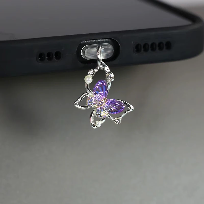Bouchon anti-poussière papillo - Mobile Tech Accessories avis et prix